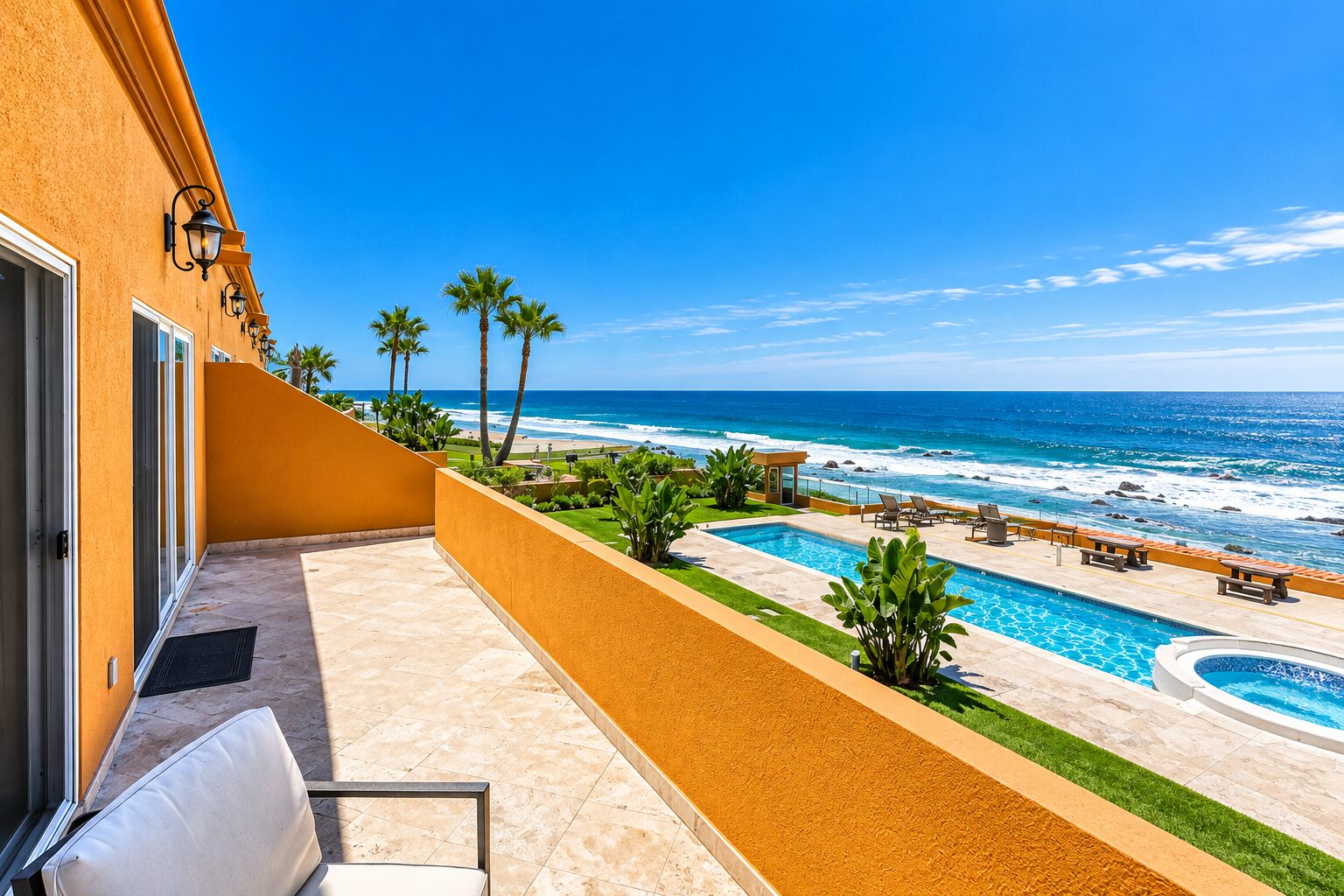 Pool, jacuzzi and beach from a balcony at La Jolla Real Rosarito